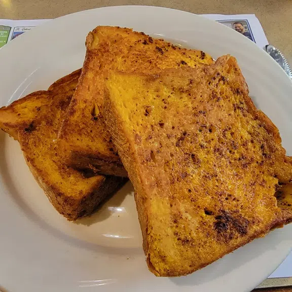 Golden brown French toast breakfast platter